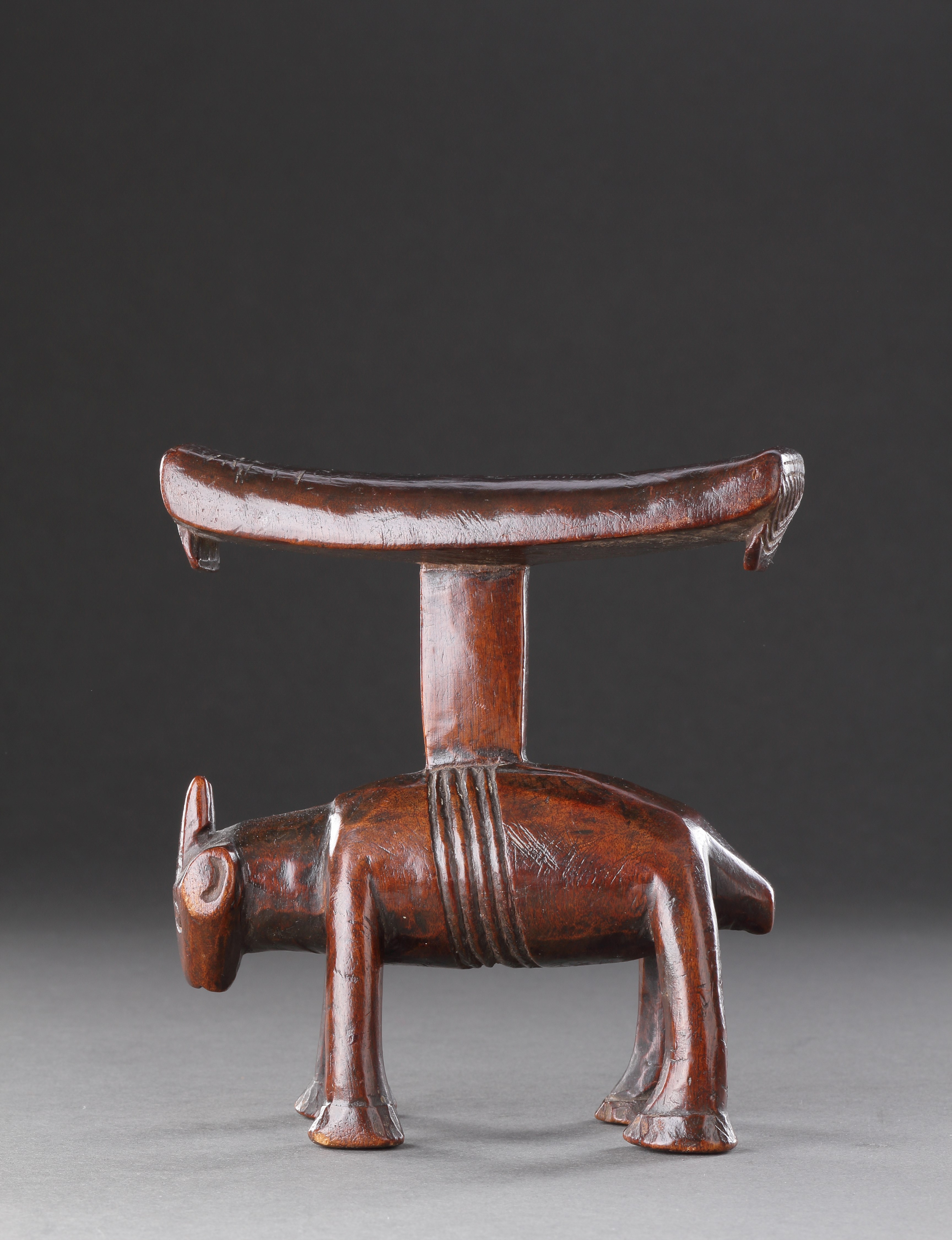 A Finely Carved Zoomorphic Headrest in the Form of an ‘Antelope’ 